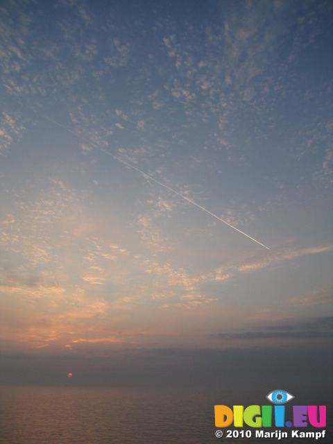 SX14849 Sunrise and airliner over channel